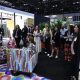 colorful tile display in front of an audience at Coverings