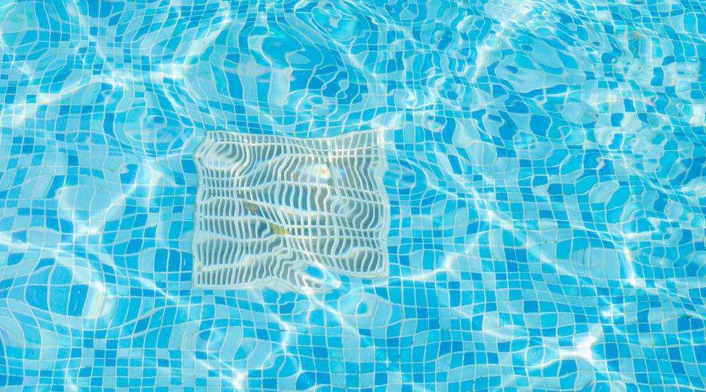 RE: Hair Entanglement In The Pool - Decreased distance between the suction pipe and the underside of the drain cover increases the flow through the drain cover.