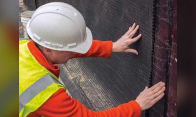 Pool Contractor Using Drainage Mat During Pool Construction