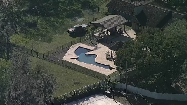 The revolver shaped swimming pool is located in Odessa, FL - Credit: Reddit